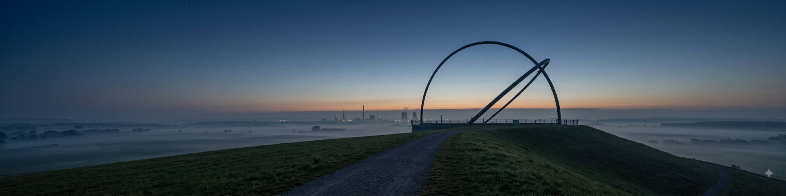 Decorative image, shows an artistic view of a landscape that ressemble a typical Ruhr view during the early blue-hour.